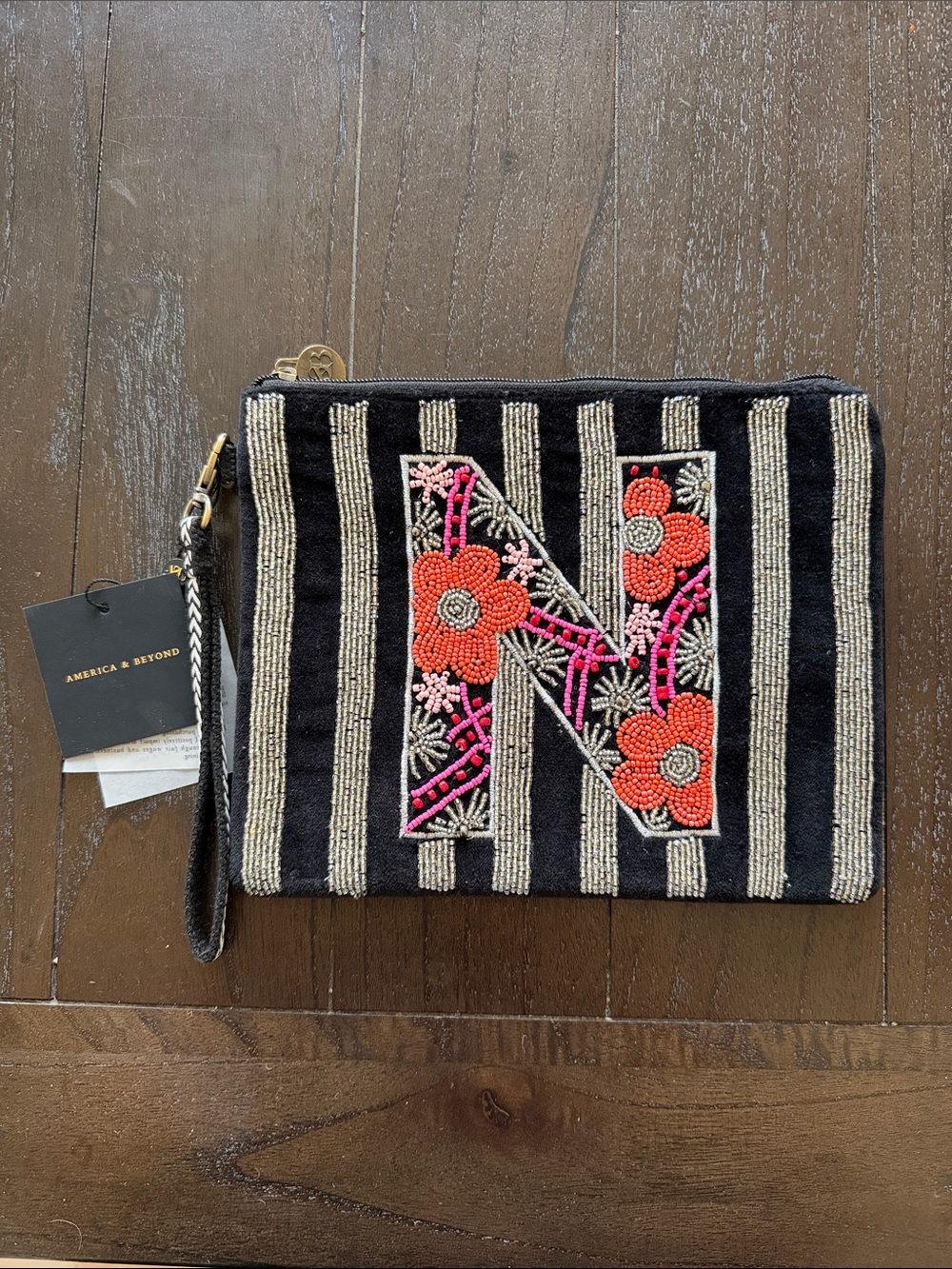 America & Beyond Black Striped Wristlet Clutch with Embroidered Floral 'N'